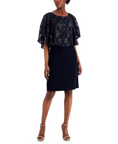 Something to toast to. Connected combines a stretch skirt with a shimmering floral cape overlay for style worth celebrating. Cocktail Party Dresses, Semi Formal Dresses, Stretch Skirt, Jean Shirt Dress, Review Dresses, Cape Dress, Unisex Baby Clothes, Clothing Outfits, Navy Blue Dresses