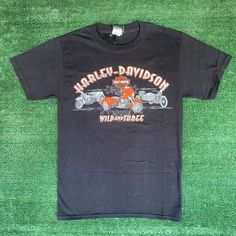 harley davidson t - shirt on green carpet