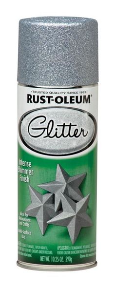 a can of silver glitter paint with stars on the bottom and one star in the middle