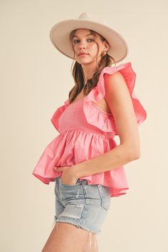 Expertly crafted with a fitted bodice and smocked back, this Ruffle Sleeve Babydoll Top features a sweet sweetheart neckline and charming ruffled flutter sleeves. Top stitch details on the bust give it a touch of texture, while the lined peplum hem adds a dose of femininity. Elevate your wardrobe with this must-have piece. Summer Smocked Top With Ruffled Straps, Feminine Smocked Top With Ruffles For Spring, Spring Smocked Top With Ruffled Straps And Details, Spring Smocked Top With Ruffles And Ruffled Straps, Pink Tops With Smocked Back And Ruffled Straps, Feminine Ruffled Tops With Sweetheart Neckline, Pink Smocked Top With Ruffles For Spring, Spring Pink Smocked Top With Ruffles, Smocked Ruffle Top For Brunch With Short Sleeves