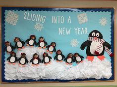 a bulletin board with penguins and snowflakes on it that says sledding into a new year