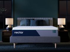 the nectar mattress is made up and ready to be used as a night stand or bed