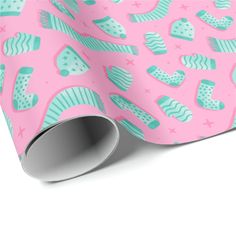 pink and blue wrapping paper with fish on it