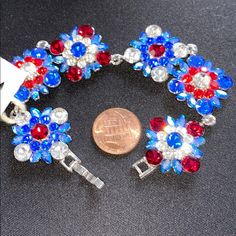 Measures 7”3/4 Long Signed Tiramisu Silver Tone New Condition Blue Crystal Bracelet With Rhinestones For Party, Blue Rhinestone Crystal Bracelet For Party, Blue Crystal Bracelet With Rhinestones, Red Crystal Bracelets With Rhinestones, Red Crystal Rhinestone Bracelet For Party, Red Crystal Bracelet With Rhinestones For Party, Red Rhinestone Crystal Bracelet For Party, Heart Bangle Bracelet, Dangle Bracelet