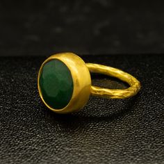 Green Emerald Ring | 24K Gold Plated | Minimalist Jewelry | Statement 925 Sterling Silver Ring | Birthstone Ring | Dainty Ring Our shop offer free ring sizing Handcrafted hammered ring Metal : 925 Sterling Silver Plating : 24K Gold Band Width : 2 mm Gem Stone : Lab Emerald Gem Size : 11 mm Ring Weight : 4.3 grams Ring Size : US 6 (The size you want is made for free). (We used the US standard sizing) **Custom Orders is Made** As pellada family, we will be happy to help you if you contact us with Gold Minimalist Emerald Ring In Sterling Silver, Minimalist Gold Emerald Ring In Sterling Silver, Minimalist Gold Emerald Ring For Everyday, Handmade Minimalist Emerald Ring, Hammered Jewelry, Green Emerald Ring, Emerald Gem, Hammered Rings, Coin Ring