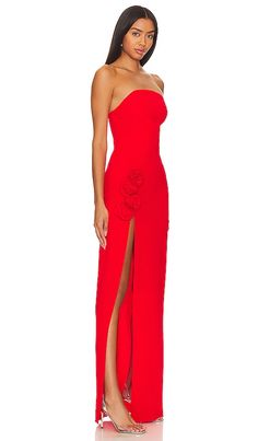 Find AMANDA UPRICHARD X Wolfe Gown In Red on Editorialist. Amanda Uprichard X REVOLVE Wolfe Gown in Red. - size L (also in M, S, XL, XS) Amanda Uprichard X REVOLVE Wolfe Gown in Red. - size L (also in M, S, XL, XS) Say hello to the Wolfe Gown from Amanda Uprichard X REVOLVE. It's not just another red dress - it's THE red dress. Dive into its dreamy crimson shade that gives classic elegance a fresh twist. The boned bodice- It's all about making you feel and look your best. And let's talk about th 2025 Prom Dresses, Prom Dress Inspo, School Dance Dresses, Amanda Uprichard Dress, Boned Bodice, Strapless Neckline, Amanda Uprichard, Floor Length Gown, Strapless Gown