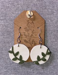 Sage green vines with a white background dangle earrings. Nature-inspired White Drop Earrings, White Nature-inspired Drop Earrings, Botanical Green Drop Earrings, Green Botanical Drop Earrings, Handmade White Leaf-shaped Earrings, White Leaf-shaped Earrings With Ear Wire, Handmade White Botanical Earrings, Chandbalis Earrings, Long Turquoise Earrings