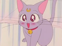 a cartoon cat with its tongue out and eyes wide open