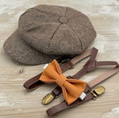 Elevate your style with our handcrafted newsboy hat, Butterscotch bow tie & Skinny Leather suspenders-ideal for wedding , parties , birthdays and proms. They make a distinguished choice for groomsmen and ring bearers, adding sophisticated touch to any special event . When making a purchase, you can choose from the following options : -Hat only -Hat+ bow tie -Hat + Suspenders  - 3 Pieces Set ( hat + bow +suspenders ) - Bow tie only  - Suspenders only  - Bow tie + Suspenders  We Will not accept an Classic Adjustable Hat With Bow, Adjustable Brown Bow Tie For Party, Adjustable Brown Bow Tie In Dapper Style, Adjustable Brown Hat For Gift, Bow Tie Ring, Tie Ring, Bearer Outfit, Bowtie And Suspenders, Ring Bearer Outfit