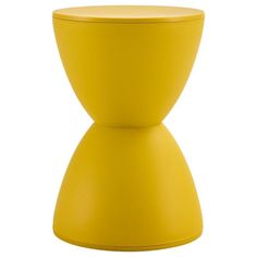 a yellow stool sitting on top of a white floor