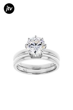 Bella Luce �� white diamond simulant 2.97ctw round, rhodium over sterling silver ring with band. Measures approximately 0.81"L x 0.31"W and is not sizeable. The diamond equivalent weight is 2.04ctw. Fine Jewelry Stackable Solitaire Rings In Cubic Zirconia, Fine Jewelry Solitaire Stackable Rings With Cubic Zirconia, Fine Jewelry Solitaire Cubic Zirconia Stackable Rings, Fine Jewelry Stackable Solitaire Cubic Zirconia Rings, White Gold Solitaire Stackable Rings With Cubic Zirconia, Solitaire Cubic Zirconia Stackable Rings, Cubic Zirconia Solitaire Stackable Rings, Silver Solitaire Stackable Rings, Classic Sterling Silver Bridal Set