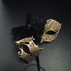 Both metallic masks come in black/gold and are embedded with clear rhinestones(women's mask only ) to make any couple look like a power couple. Black And Gold Mask, Black And Gold Masquerade Mask, Gold Masquerade Mask, Mask Ball, Masquerade Prom, Gold Gloves, Ball Mask, Female Mask, Party Mask