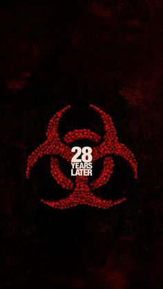 the poster for 28 years later shows a red biohazard sign on a black background