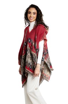 Elevate your festival look with this layer-ready poncho that features a drawstring hood and allover eye-catching pattern. Drawstring hood Short sleeves 73% acrylic, 12% viscose,9% wool, 6% lurex Dry clean Imported Red Poncho For Festival In Fall, Red Bohemian Poncho For Winter, Red Fall Festival Poncho, Hooded Red Poncho For Fall, Hooded Fall Festival Poncho, Red Hooded Poncho For Fall, Red Bohemian Hooded Poncho, Red Hooded Bohemian Poncho, Red Cape Poncho For Festival