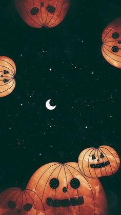 pumpkin lanterns with faces drawn on them floating in the air at night, surrounded by stars and moon