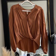 Free People Blouse With Long Back Brown V-neck Blouse For Day Out, Elegant Brown Blouse For Brunch, Brown Long Sleeve Blouse For Brunch, Brown V-neck Top For Brunch, Brown Fall Blouse For Day Out, Chic Brown V-neck Top, Chic Brown Tops For Brunch, Casual Brown Blouse For Brunch, Brown Blouse For Fall Day Out