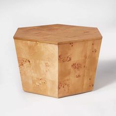 a wooden box sitting on top of a white surface