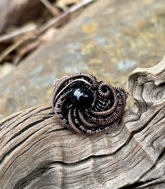 Wire Wrapped Copper and Black Onyx Ring. Size 9 1/2 Artisan Black Cabochon Jewelry, Black Round Copper Jewelry, Unique Black Spiral Jewelry, Black Copper Round Jewelry, Hanna Design, Wrapped Rings, Wire Jewelry Designs, Black Onyx Ring, Wire Wrapped Rings