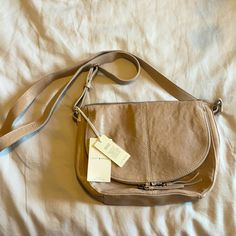 Lucky Brand Real Leather Crossbody Bag, Brand New With Tags, Light Tan/Cream Color, Great With Fall Color Schemes Casual Taupe Crossbody Bag, Neutral Crossbody Satchel For Travel, Neutral Crossbody Bag For Everyday Use, Neutral Crossbody Shoulder Bag With Removable Pouch, Neutral Crossbody Shoulder Bag For Travel, Neutral Everyday Crossbody Satchel, Everyday Neutral Crossbody Bag, Beige Crossbody Satchel, Neutral Leather Crossbody Shoulder Bag