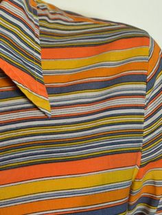 70's Striped Blouse Orange Yellow Geometric Print - Etsy Poland Orange Collared Summer Blouse, Collared Tops With Vertical Stripes For Fall, Multicolor Cotton Top With Collared Neckline, Retro Orange Cotton Shirt, Orange Button-up Cotton Blouse, Orange Cotton Button-up Blouse, Orange Relaxed Fit Collared Tops, Vintage Orange Summer Shirt, Orange Collared Cotton Top