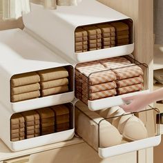 the drawers are organized with folded towels and other items