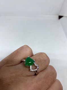 Vintage green nephrite jade Ornate German Silver ring, does not tarnish, NOT sterling Sizes 7, 8 or 9 All rings are shipped in a nice gift box. Check out our over a THOUSAND great reviews Engraving is $4 per letter and is not always perfect depending on the piece. It can take a few days if the jeweler is busy. This is payable to Paypal Judithsltd@gmail.com Formal Green Heart Cut Rings, Green Heart Ring For May Birthstone Gift, Fine Jewelry Jade Ring As Gift, Green Heart Ring For Gift In Fine Jewelry Style, Heart Shaped Green Emerald Ring For May Birthstone, Green Gemstone Heart Ring For May Birthstone, Green Heart-shaped Promise Ring, Green Gemstone Rings With Heart Cut, Fine Jewelry Green Heart Shaped Ring