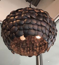 a lamp hanging from the ceiling in a room