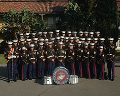 a group of men in uniform standing next to each other