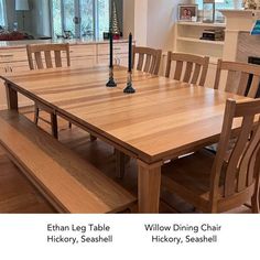 a wooden table and bench in a room with hardwood floors, windows, and cabinets