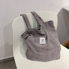 ShippingWorldwide?Express?Shipping Available Delivery time??7-15Days Fast Shipping Returns?Fast refund,?100% Money Back Guarantee. ? 30-day no-risk return policy Secure Payments?Via?CreditCard 100% brand new and high quality. ? Brand Name ?Mongw Shape ?Casual Tote Handbags Type ?Shoulder Bags Types of bags ?Shoulder Handbags Origin ?US(Origin) Main Material ?Corduroy Closure Type ?OPEN Hardness ?SOFT Exterior ?Open Pocket Style ?Fashion Lining Material ?Polyester Occasion ?Versatile Gender ?WOME Grey Tote Bag, Corduroy Bag, Grey Tote Bags, Grey Tote, Grocery Tote, Girls Handbags, Reusable Shopping Bags, Casual Tote, Shopper Tote