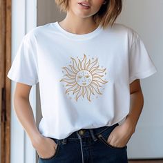 "Our mystical sun t-shirt is a must have for a growing boho wardrobe. It's a comfy shirt with a laid-back style that matches perfectly with distressed jeans, sunnies, tats and leather. You'll look cool and casual in this shirt, whether you're lounging on the band or sipping a drink in the bar. It's also a perfect gift for anyone who enjoys the vintage academia aesthetic. Try it on, we think you'll love \"An extraordinarily imaginative print, the shirt was delivered very quickly and the recipient Vintage Academia Aesthetic, Spiritual Sun, Hippie Sun, Festival T Shirt, Boho Wardrobe, Vintage Academia, Spiritual Shirts, Celestial Sun, Sun Face