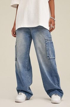 Embrace a laid-back vibe with these cargo jeans, characterized by a light wash denim that evokes a cool, relaxed aesthetic. The cotton construction ensures comfort, while the zip and button fastening provides ease of wear. Enhanced by two front, two back, and two side cargo pockets, this wide-leg pair is as practical as it is stylish. Light wash denim Men's jeans Zip & button fastening Cotton 2 front, 2 back and 2 side cargo pockets Wide leg Our model wears XL and is 5'8 (178cm) Baggy Cargo Jeans, Relaxed Aesthetic, Fall Sweaters For Women, Denim Hoodie, Jogger Pants Casual, Cardigan Sweater Vest, Streetwear Grunge, Corsets And Bustiers, Strapless Tops