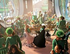 a group of people dressed in green outfits