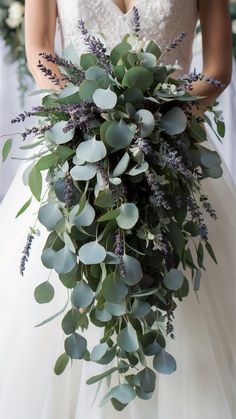 Stunning Lavender and Eucalyptus Wedding Cascade Lavender Wisteria Bouquet, Green Only Wedding Bouquet, Lavender And Sage Green Wedding Bouquet, Lavender Gray And Green Wedding, Floral Arrangements Eucalyptus, Lavender Plant Bouquet, Eucalyptus Spring Wedding, Cascading Eucalyptus Bouquet, Purple Eucalyptus Bouquet