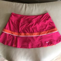 Sport Skirt With Build In Shorts. Dry Fit. Never Worn. Nike Skirted Bottoms For Summer, Nike Summer Skirt, Pink Stretch Swim Skirt For Sports, Casual Pink Skirt For Sports, Nike Lined Skort For Summer, Casual Pink Swim Skirt For Sports, Casual Pink Lined Skirt Bottoms, Nike Pleated Skirt For Summer, Nike Pink Bottoms For Spring