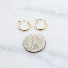 1 Pair Thick Small Latch Click 14K SOLID Gold Endless Hoop Earrings Gold Hoops These are the perfect everyday earrings that won't change color and are great for sensitive ears. ✦ Quantity: 2 pieces (1 pair) ✦ Material: 14k Solid gold ✦ Dimensions: 15mm (2mm thick) ✦ Surface: shiny gold Ships next business day. ✦✦ SAVE 15% over $75+ CODE: SAVE15✦✦ Please let us know if you are interested in a higher quantity than what is currently listed. *International customers will be responsible for Import du Earrings Gold Hoops, Earring Wires, Hoop Earrings Gold, Earring Gold, Everyday Earrings, Wire Earrings, Gold Hoops, Sensitive Ears, Gold Hoop Earrings