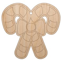 a wooden cutout of an angel with wings