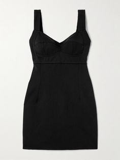 a women's black dress with straps on the back and spaghettis at the neck