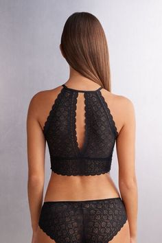 Wireless unpadded lace bra top with a soft microfiber layer at the bust. Centered back opening. May be worn on its own or with a favorite bandeau bra. Ideal to wear alone as a top or under a jacket.
The model is 5’ 9” (175 cm) tall and is wearing a size S. Elegant Lace Bandeau Bra, Cami Bra With Built-in Support For Night Out, Seamless Lace Bandeau Bra, Lace Tops With Underwire And Bra Friendly Design, Elegant Underwire Crop Top Bra Friendly, Elegant Lace Cami Bra, Backless Night-out Bra With Built-in Support, Elegant Seamless Backless Bra, Elegant Stretch Backless Bra