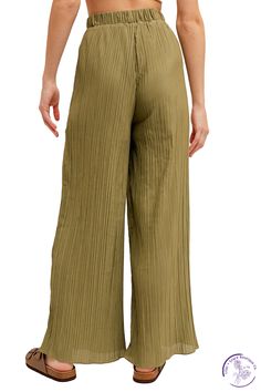 The Paradise Pleated Pant is a must-have for effortless style and comfort. With an elastic waist and pull-on design, these pleated pants offer convenience while maintaining a chic, polished look. Perfect for any occasion, these pants are a versatile addition to any wardrobe. Material: 100% Polyester Summer Wide-leg Pants With Pleated Waist, Chic Wide Leg Pull-on Pants For Day Out, Relaxed Fit Wide-leg Pants With Pleated Waist, Summer Pleated Relaxed Fit Pants, Versatile Pleated Spring Bottoms, Versatile Pleated Bottoms For Spring, Summer Trousers With Pleated Waist, Pleated Relaxed Fit Ankle-length Pants, Pleated Relaxed Fit Wide Leg Pants