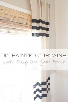 curtains with black and white stripes are hanging in front of a window that has the words diy painted curtains on it