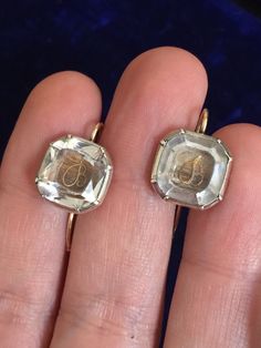 This is a stunning pair of Stuart Crystal earrings from my personal collection circa 1700.  They are in remarkable antique condition for their age.  They have been highly polished by the previous owner so there is no 300+ year patina any longer.  The silver shines like they were made yesterday and this really accentuates the brightness of the crystals. I had purchased these earrings from an antique jewelry store in London.  The pair caught my attention because I had never seen a "B" inside a Stu Antique Earrings With 17 Jewels For Ceremonial Occasions, Vintage Gold Earrings With Rose Cut Diamonds, Victorian Hallmarked Earrings For Ceremonial Occasions, Vintage Rose Cut Diamond Earrings For Formal Occasions, Antique Round Earrings With Rose Cut Diamonds, Antique Rose Cut Diamond Earrings, Luxury Engraved Earrings For Formal Occasions, Antique White Gold Earrings With 17 Jewels, Antique Hallmarked Earrings For Anniversary