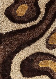 an area rug with brown and white designs on the carpet, including circles in different colors