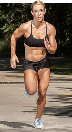 a woman running on the road with an ad in front of her