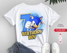 sonic the hedgehog birthday t - shirt and denim shorts with white sneakers next to it