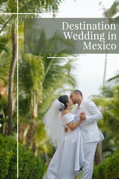 a bride and groom kissing in front of palm trees with the words destination wedding in mexico