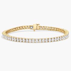 Simple and brilliant, this classic tennis bracelet features Oval cut diamonds framed in 14k yellow gold. Platinum Rose Gold, Engagement Rings Marquise, Gold Rings Fashion, Diamond Tennis Bracelet, Gold Pearl Necklace, Ladies Diamond Rings, Oval Cut Diamond, Yellow Gold Chain, Tennis Bracelet Diamond