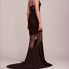 Sultry Silk Gown Pieced With Delicate Lace Along The Bust, Legs, And Hem. Beautiful Eyelash Lace Trim With Adjustable Straps For A More Customizable Fit. 100% Silk Lace: 100% Nylon Dry Clean Import Fitted Sheer Black Gown, Lace Bias-cut Maxi Dress For Evening, Elegant Gown With Sheer Back For Night Out, Elegant Black Gown With Sheer Back, Floor-length Lace Evening Dress For Night Out, Evening Fitted Maxi Dress With Lace Back, Fitted Black Gown With Bias Cut, Floor-length Gown With Sheer Bodice For Night Out, Black Floor-length Gown With Sheer Back