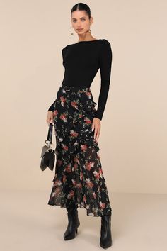 The Lulus Marvelously Charming Black Floral Ruffled High-Rise Maxi Skirt will quickly make its way into your weekly favorites rotation! Airy woven chiffon boasts a darling floral print throughout as it shapes a high, banded waist and a sleek, column-like silhouette. Asymmetrical ruffle trim at the front and back lends a whimsical touch, while a flared, slightly sheer maxi hem completes the look. Hidden back zipper/clasp. Fit: This garment fits true to size. Length: Ankle length. Size medium meas Chic Flowy Maxi Skirt With Layered Hem, Chic Flared Maxi Skirt With Ruffle Hem, Chic Tiered Maxi Skirt For Brunch, Chiffon Tiered Maxi Skirt With Floral Print, Black Tiered Wrap Skirt For Spring, Chic Flowy Ruffled Skirt, Chic Midi Skirt With Layered Hem, Elegant Maxi Skirt With Layered Hem, Black Ruffled Maxi Skirt For Spring