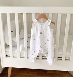 Unisex romper in our White Elephant Baby Moon's print. All of our rompers are made from organic single jersey. Sizes from newborn up to 24 months. - Organic jersey - Sizes newborn to 24 months - Poppers at shoulders - Leg poppers for easy nappy changes - Gusset for extra nappy room (including cloth nappies) - Stamped in labels for comfort - Lined top half for extra durability - Organic cotton 92% / Lycra 8%  - All orders come wrapped in our branded recyclable tissue paper.  Organic cotton 92% / Lycra 8%  To care for your garment, please wash inside out at 30 degrees. Hang to dry, do not tumble dry. Iron on medium. We love to see photos of your little ones in their rompers, please tag us on Instagram at @wonderandwren and we will share your photos! Baby Moon, Cloth Nappies, Babymoon, Elephant Baby, Moon Print, White Elephant, Organic Baby, Baby Elephant, Gender Neutral Baby